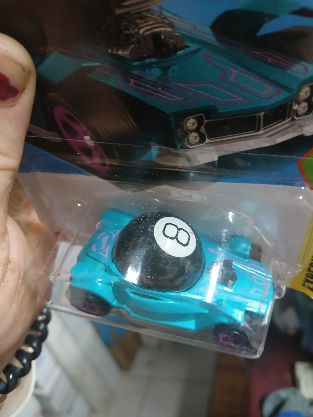 teal Hot Wheels Decidedly Go features a functional Magic 8 Ball design from the